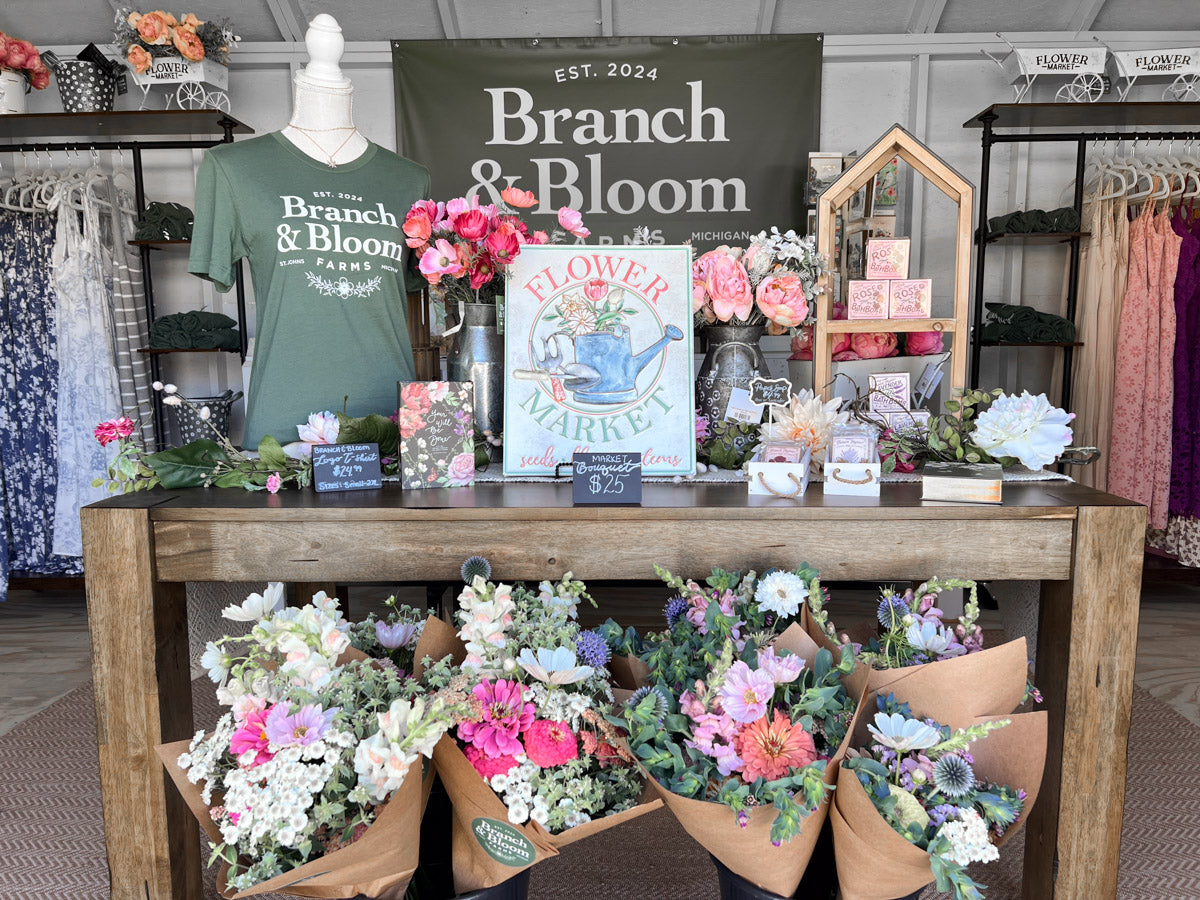 Display of flowers and merchandise with in the Branch and Bloom Farms Farmstand