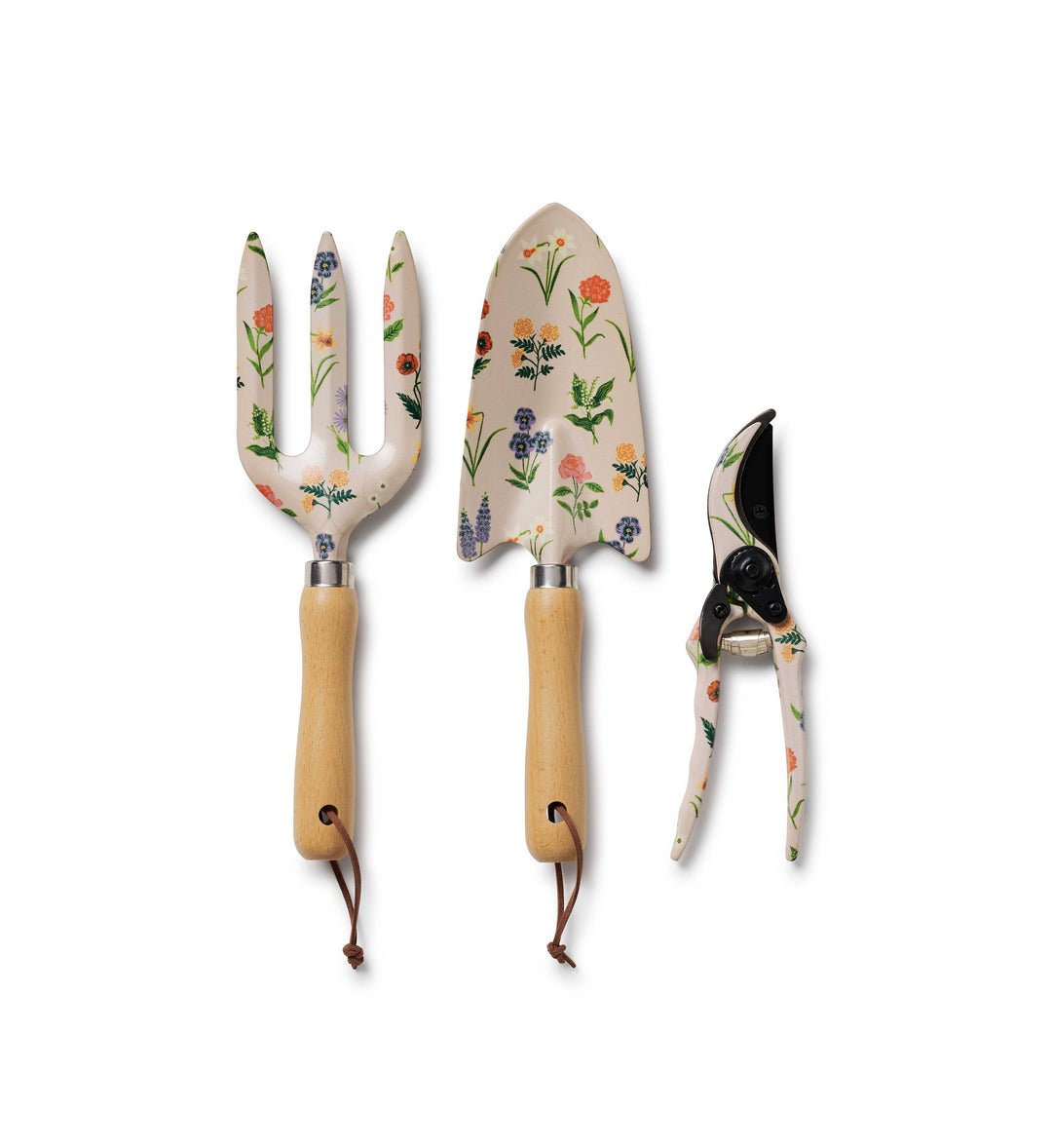 Set of three floral garden tools with wooden handles on a white background
