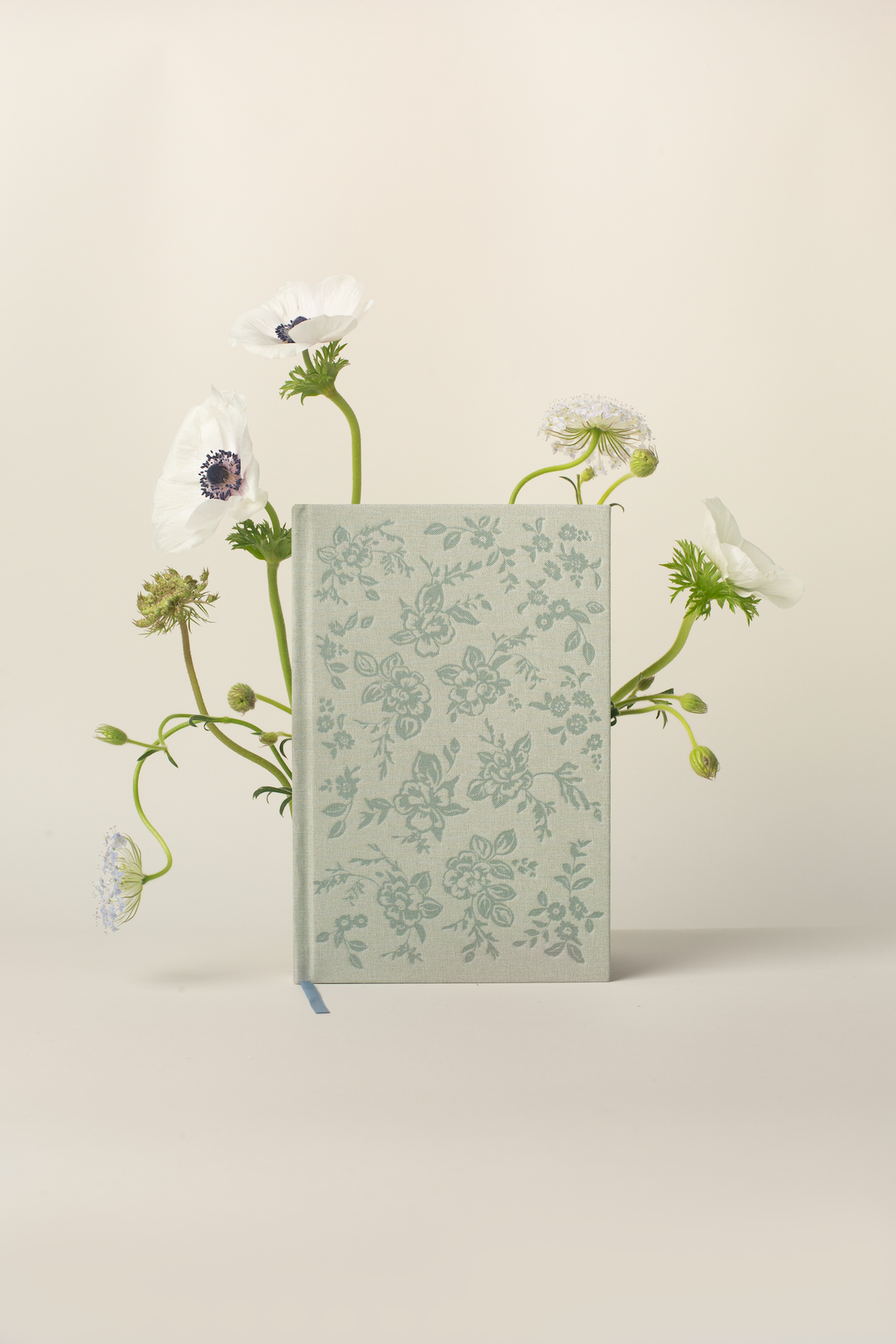 Floral sketchbook with flowers on a beige background