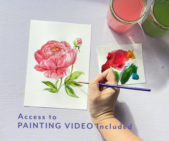 Hand painting a floral design on paper with watercolor paints.