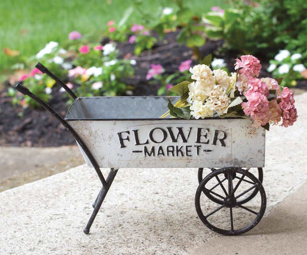 Distressed metal flower market cart