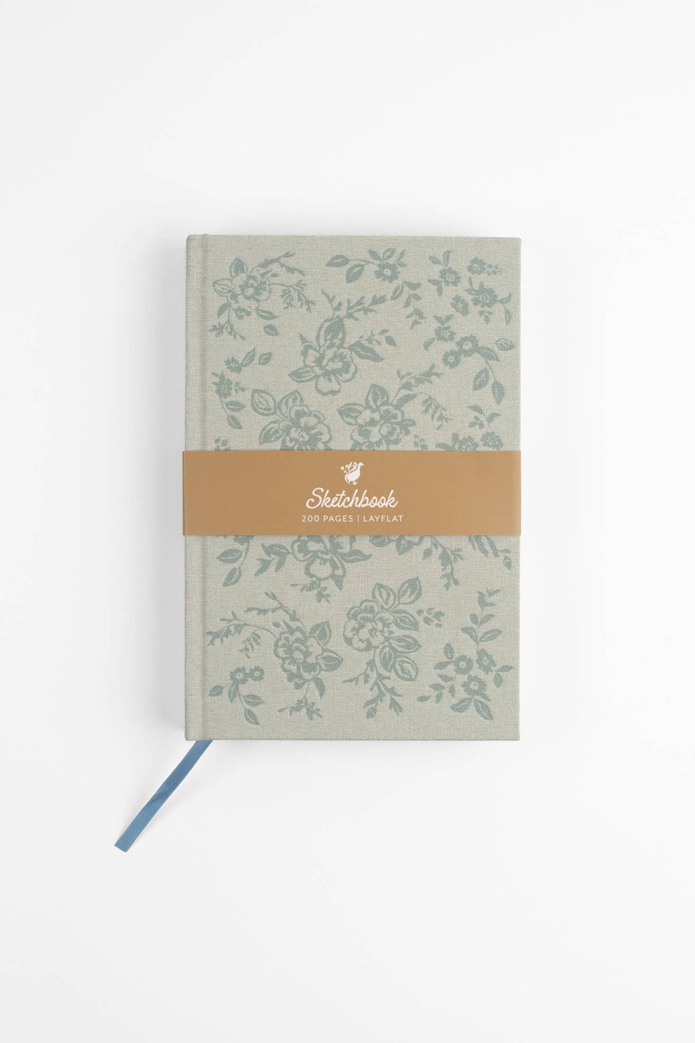 Floral-patterned notebook with a brown band on a white background