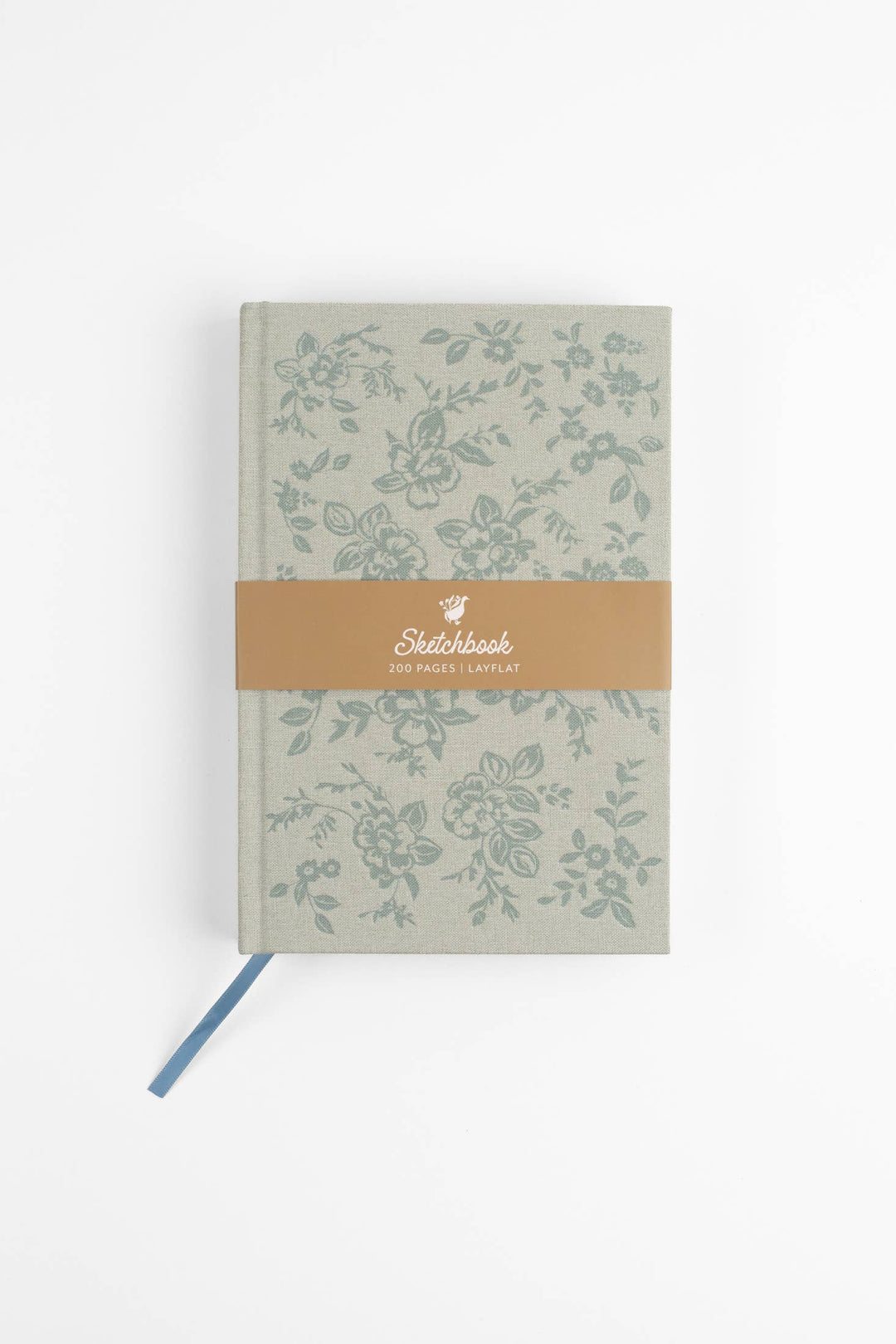 Floral-patterned notebook with a brown band on a white background