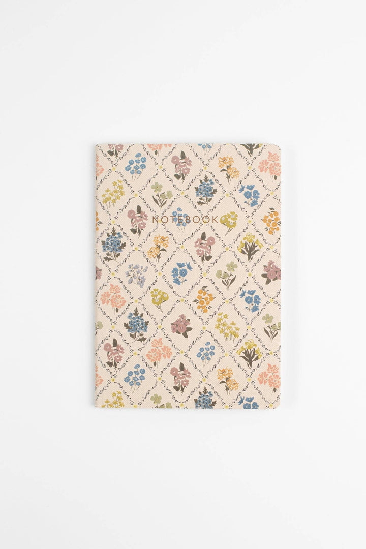Notebook with floral pattern on a white background