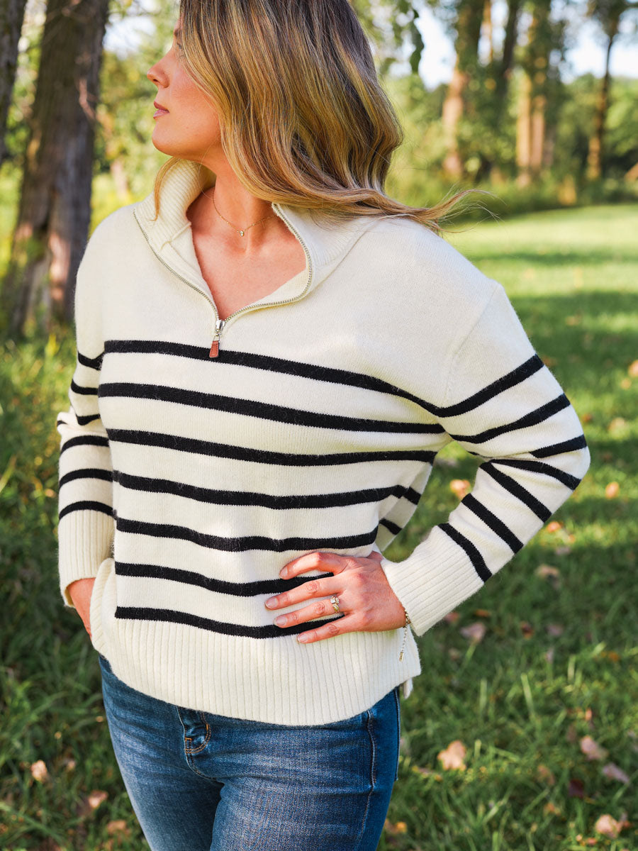 Ivory and black striped quarter zip pullover sweater