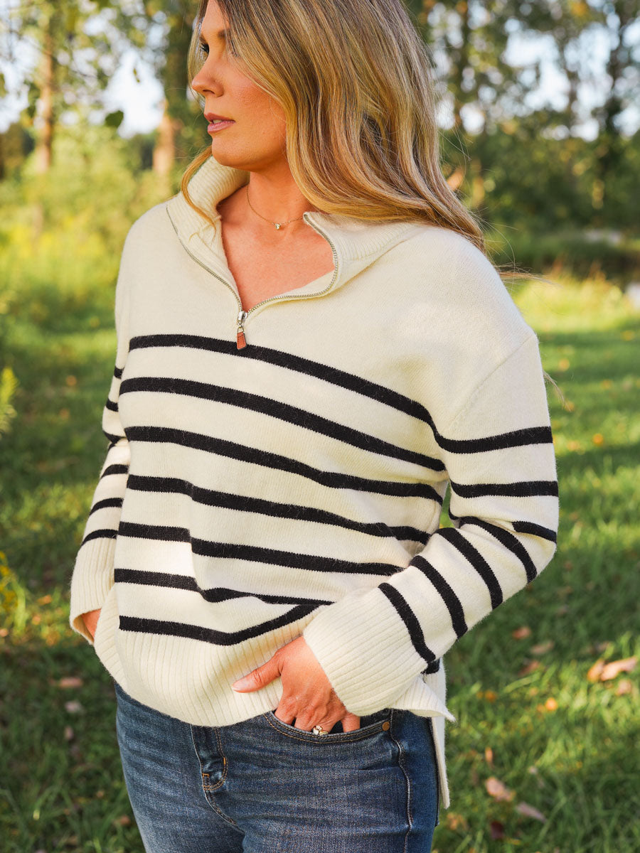 Ivory and black striped quarter zip pullover sweater