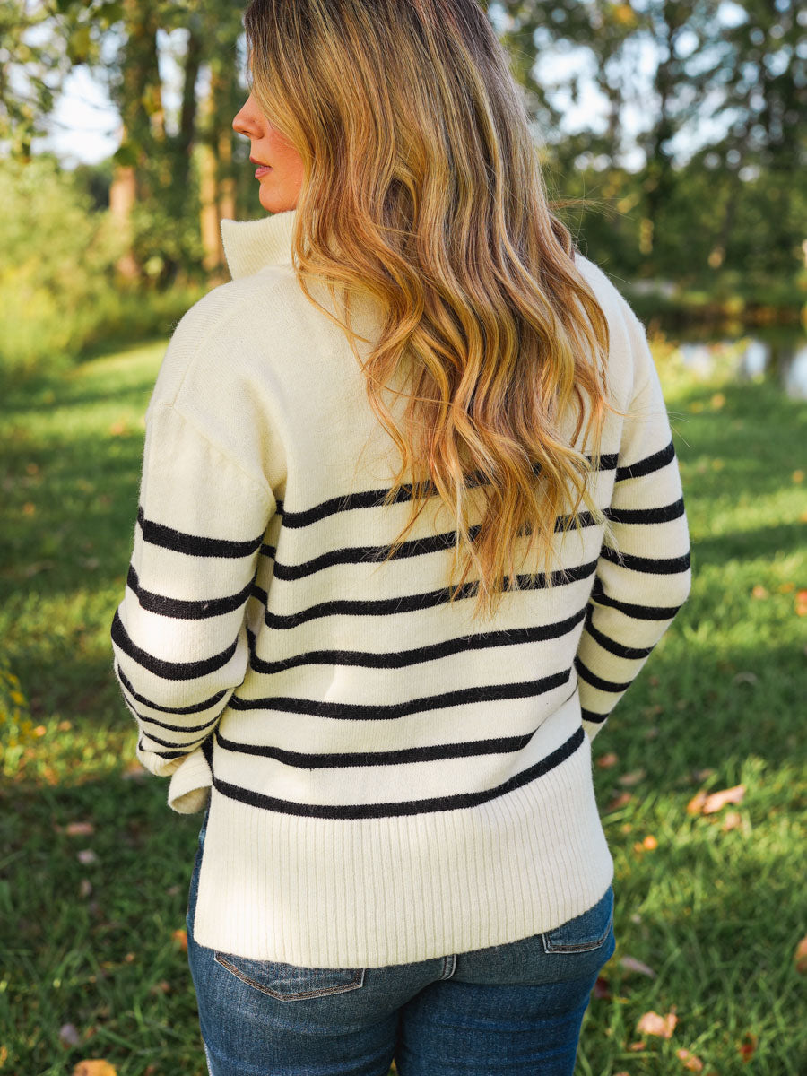 Ivory and black striped quarter zip pullover sweater