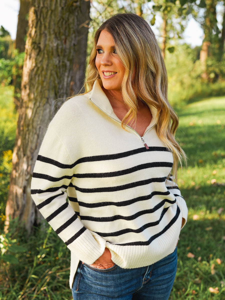 Ivory and black striped quarter zip pullover sweater