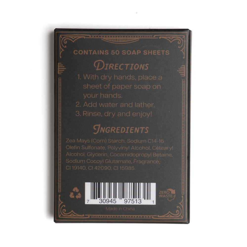 The back of a dark brown soap sheet package, showing directions and ingredients text in gold and light brown lettering, with a barcode at the bottom, photographed on a white background.