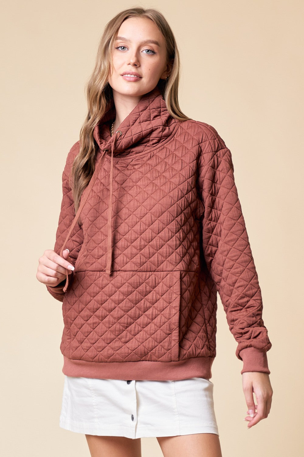 Quilted funnel neck pullover in rust