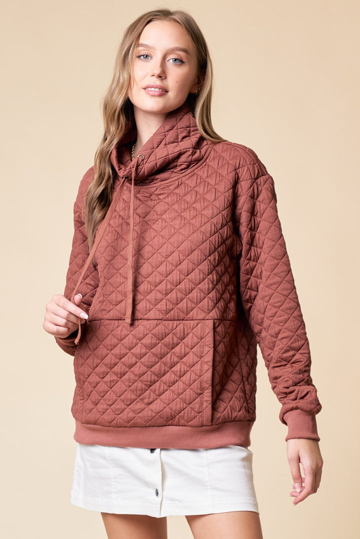 Quilted funnel neck pullover in rust