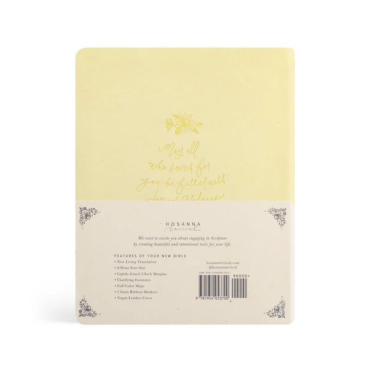 Back cover of a yellow Bible with decorative elements and text on a light background
