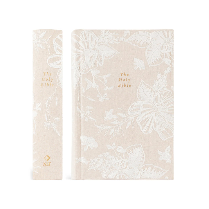 Embroidered floral design Bible with 'The Holy Bible' text on a white background
