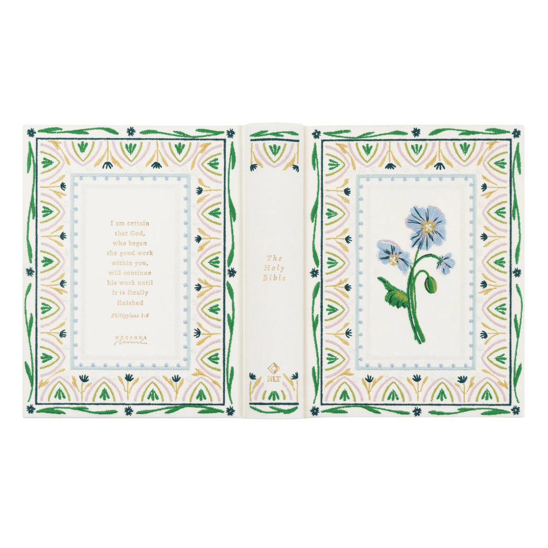 Embroidered floral Bible with text on a white background