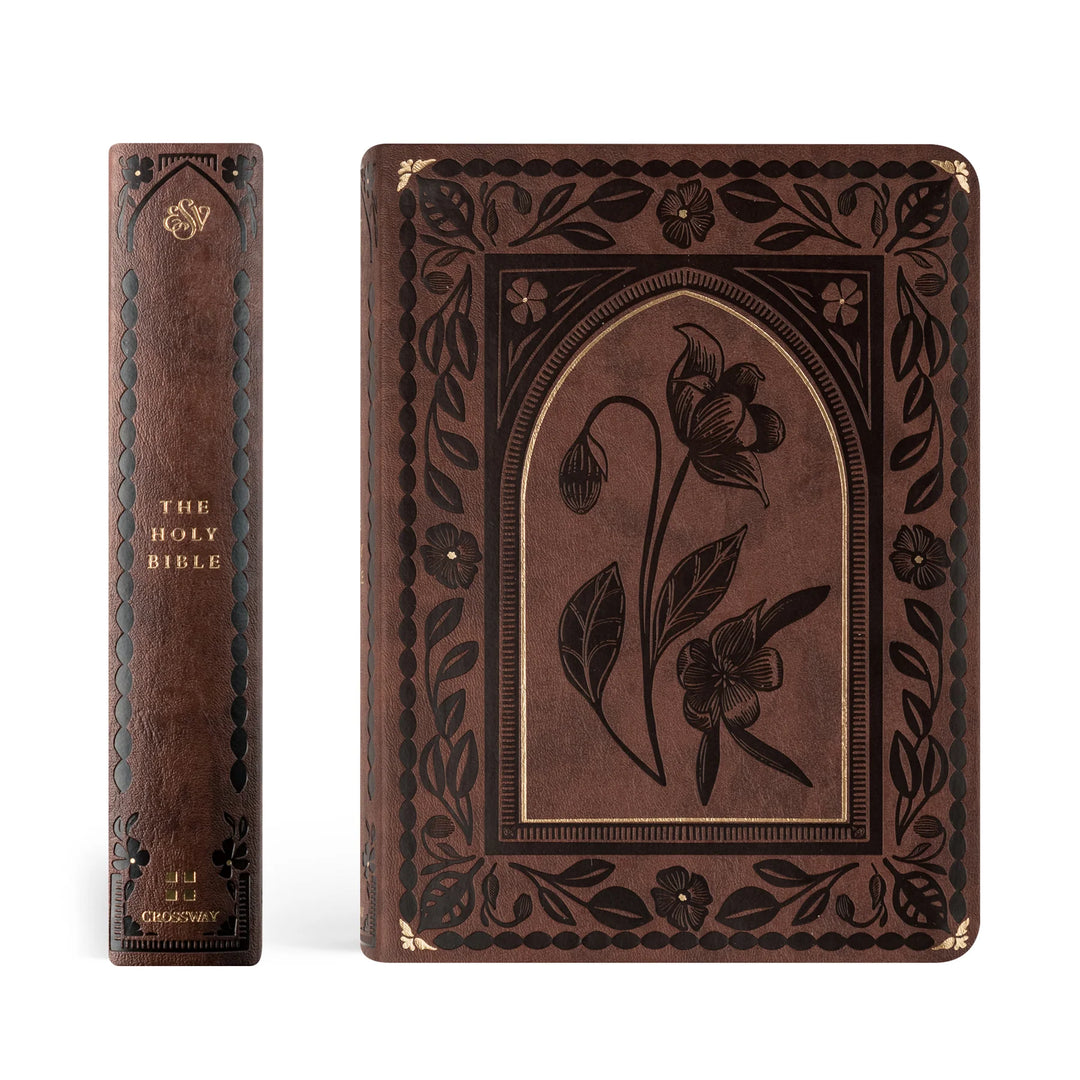 Decorative brown ESV Bible with floral design on a white background