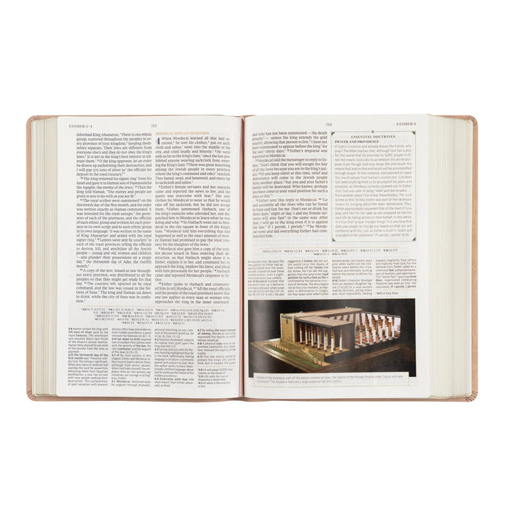 Open Bible with text and a small image of a building on a white background