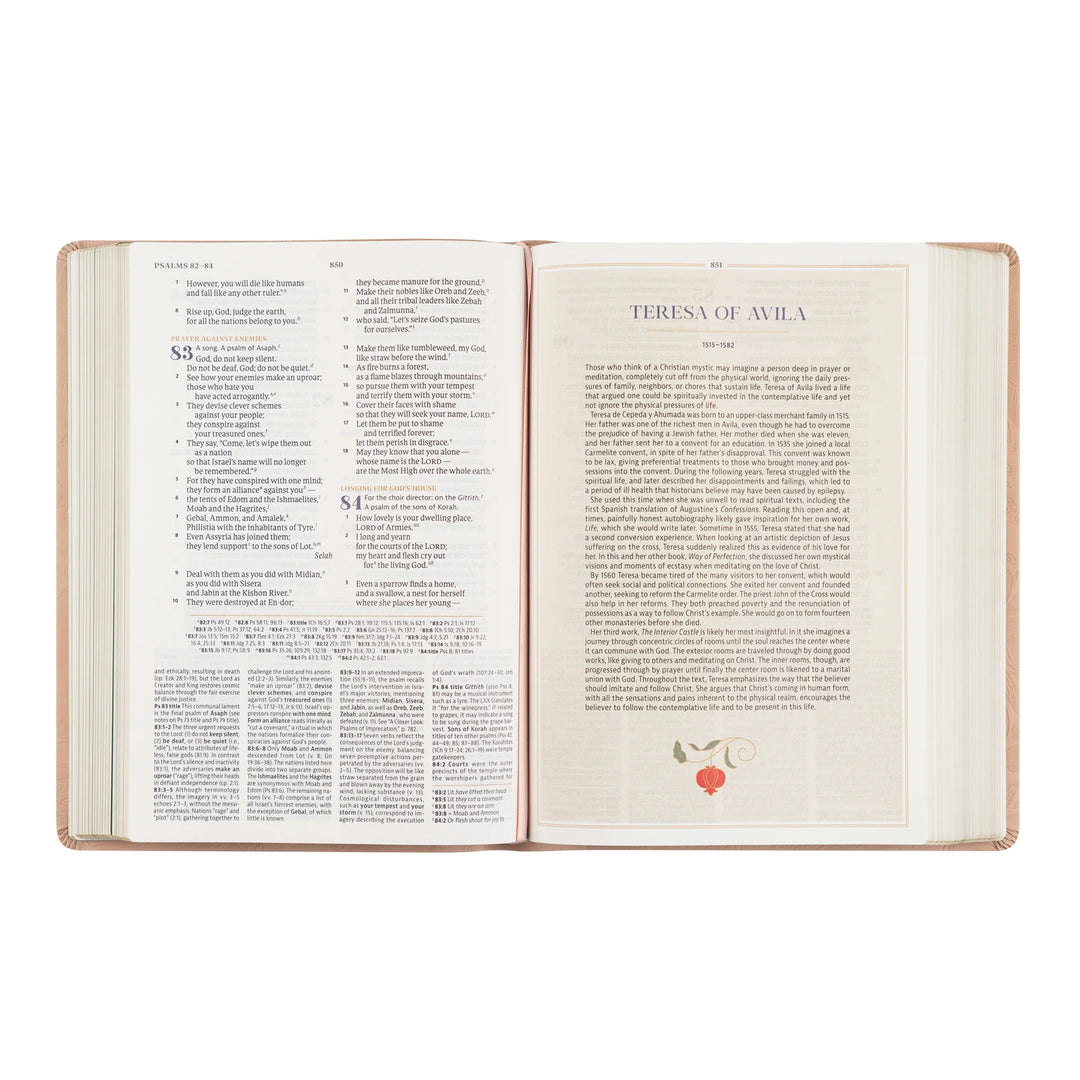 Open Bible with text and a decorative emblem on a white background