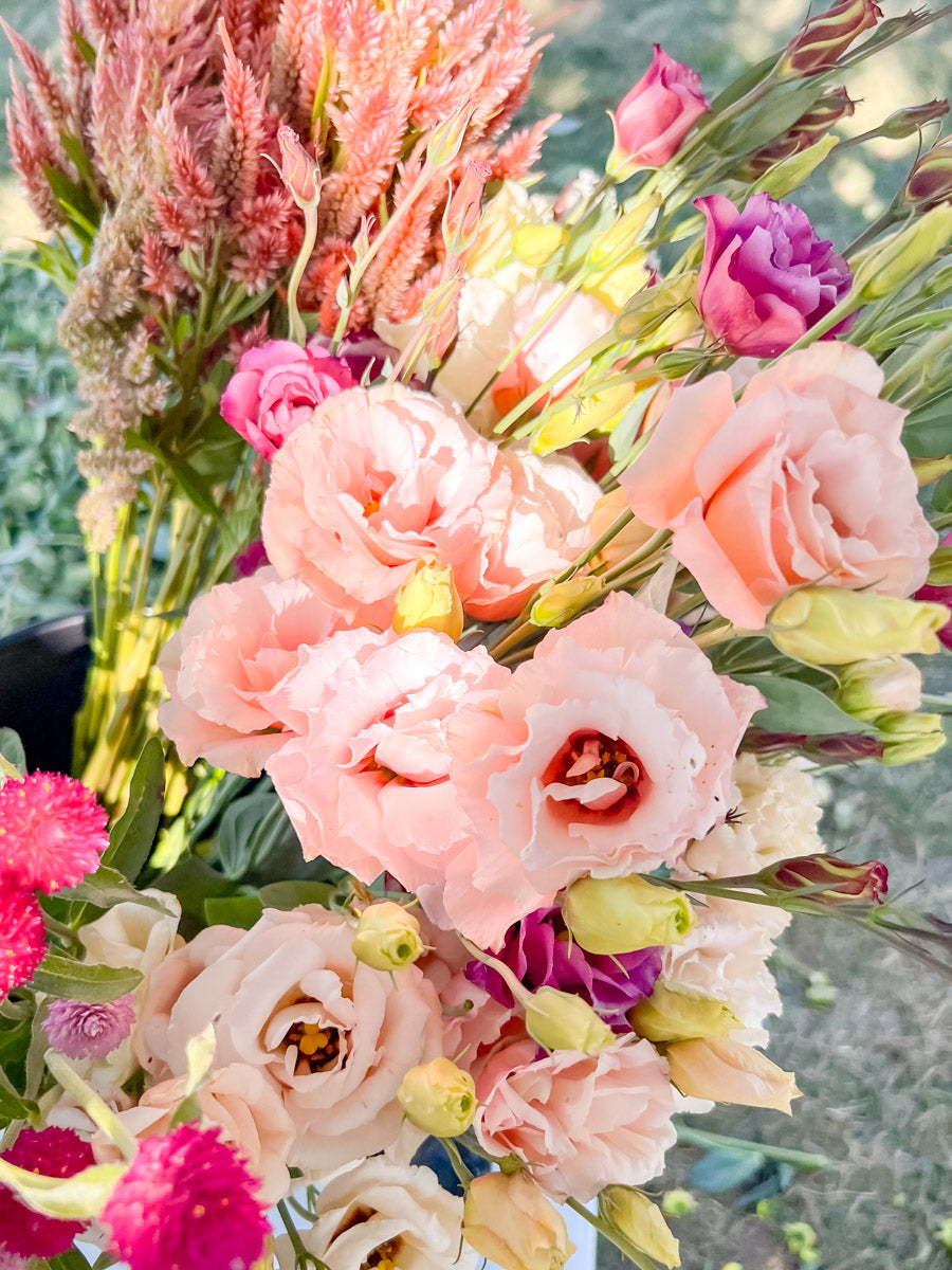 Bouquet of pink lisianthus flowers with greenery