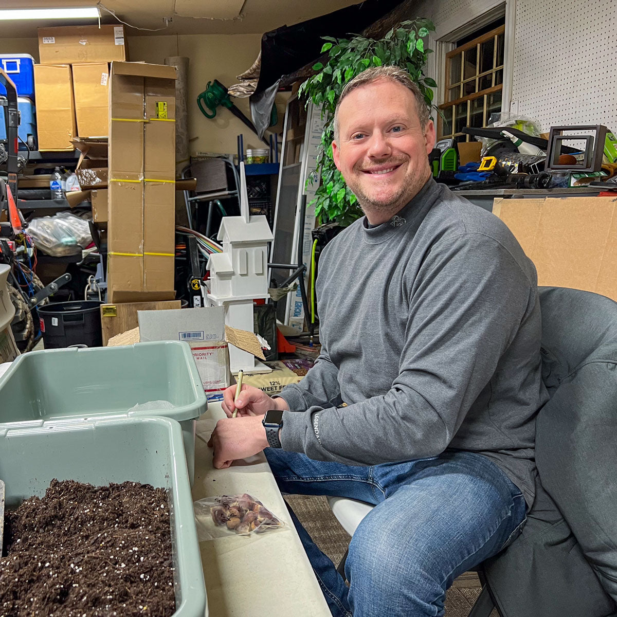 Jason Miller of Branch and Bloom Farms starting chestnut trees in his garage