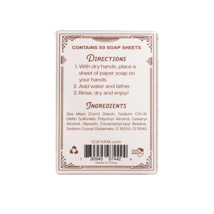 Back of a paper soap package with directions and ingredients listed on a white background