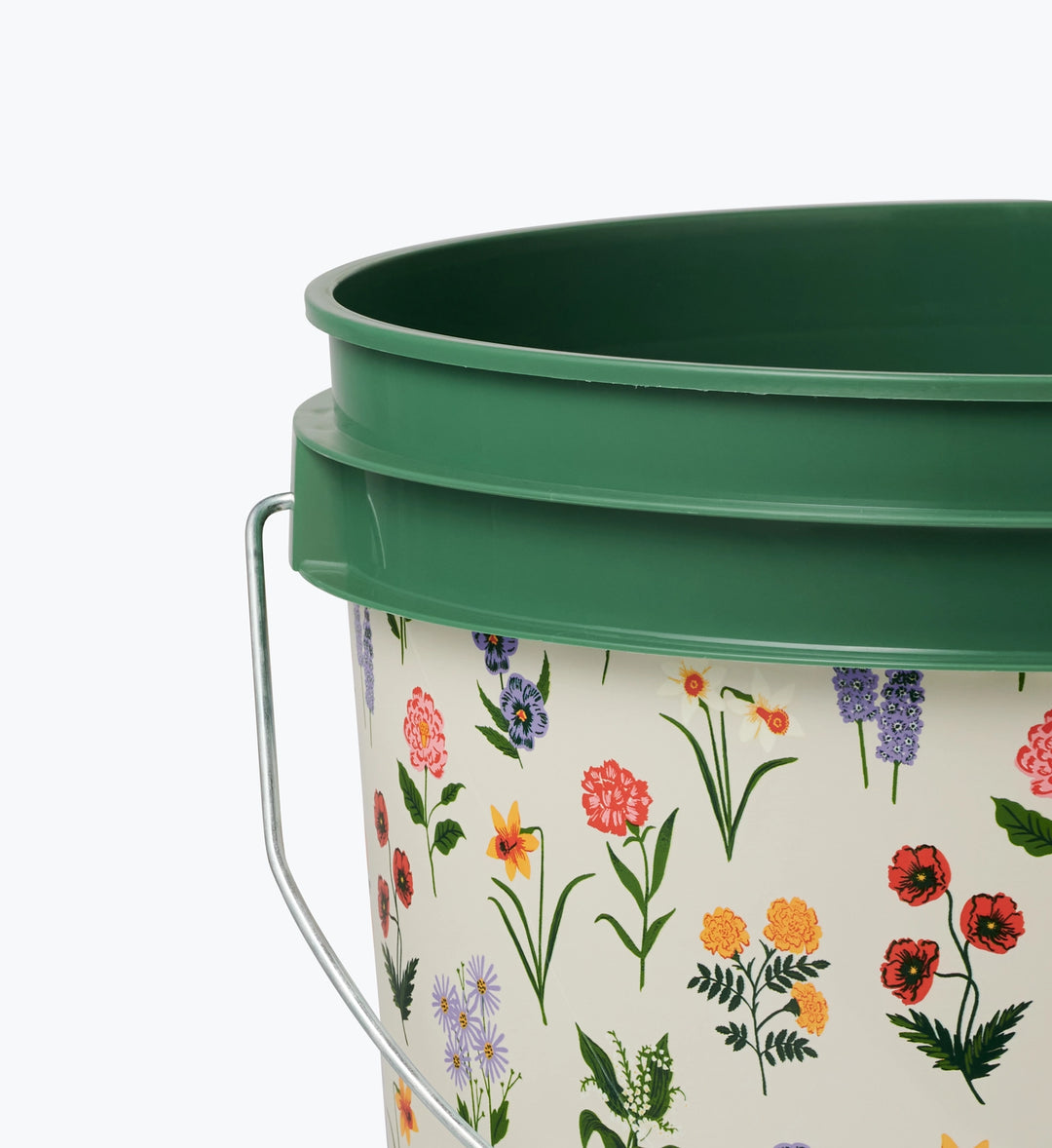 Green plastic bucket with floral pattern on a white background