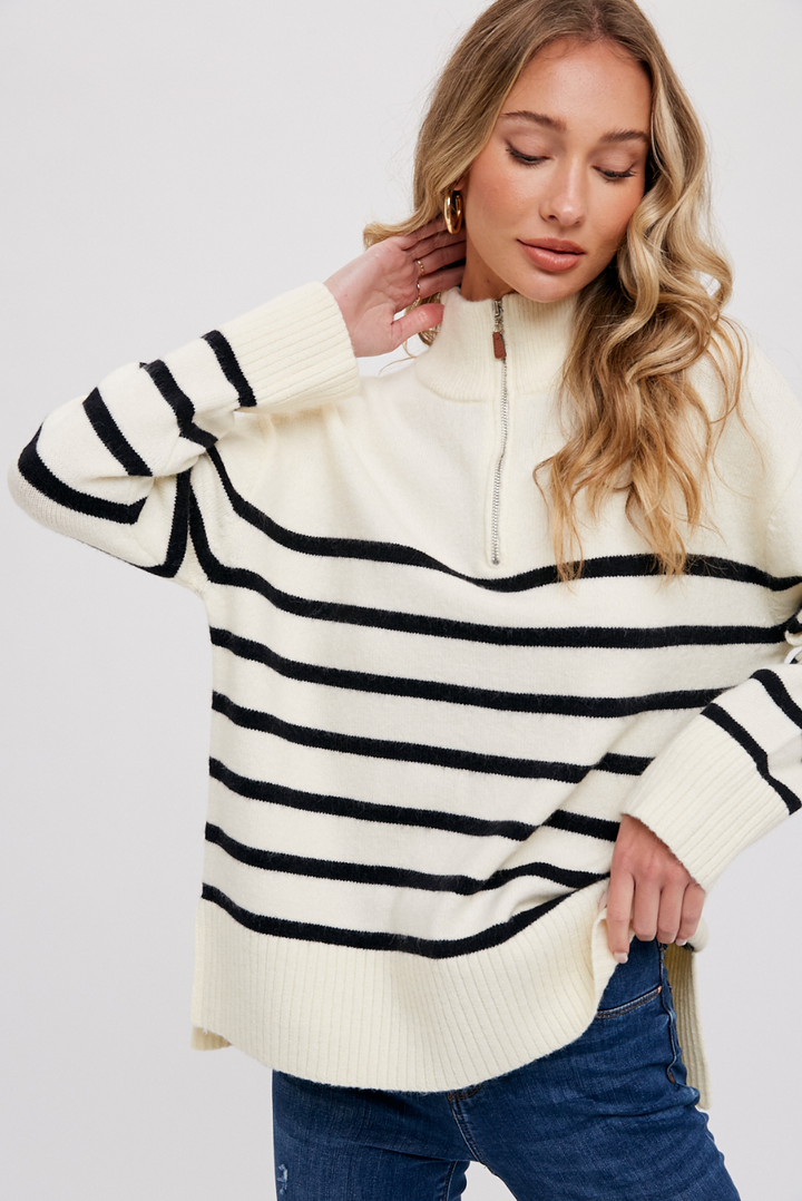 Ivory and black striped quarter zip pullover sweater