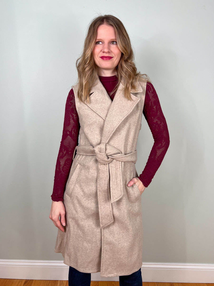 Sleeveless vest coat with belted waist