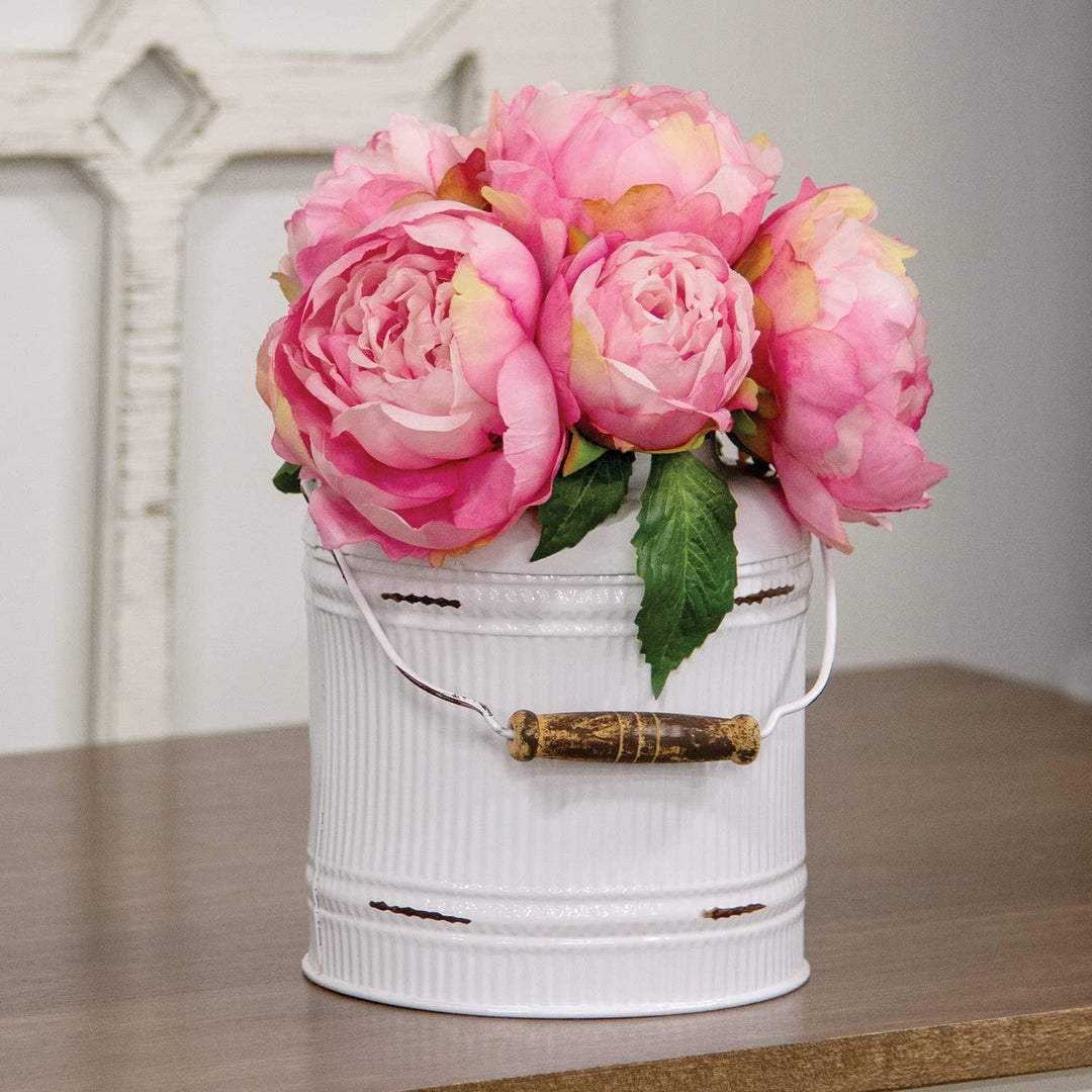 Distressed white metal flowers and garden bucket with handle