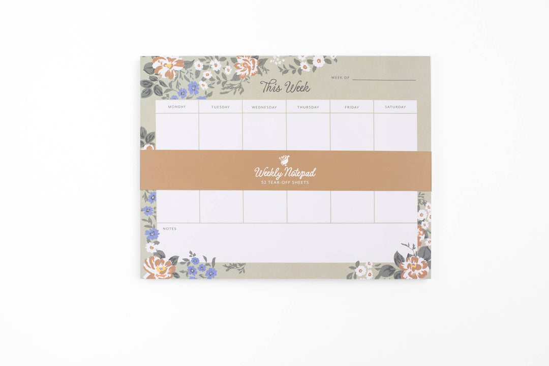 Weekly planner with floral designs on a white background