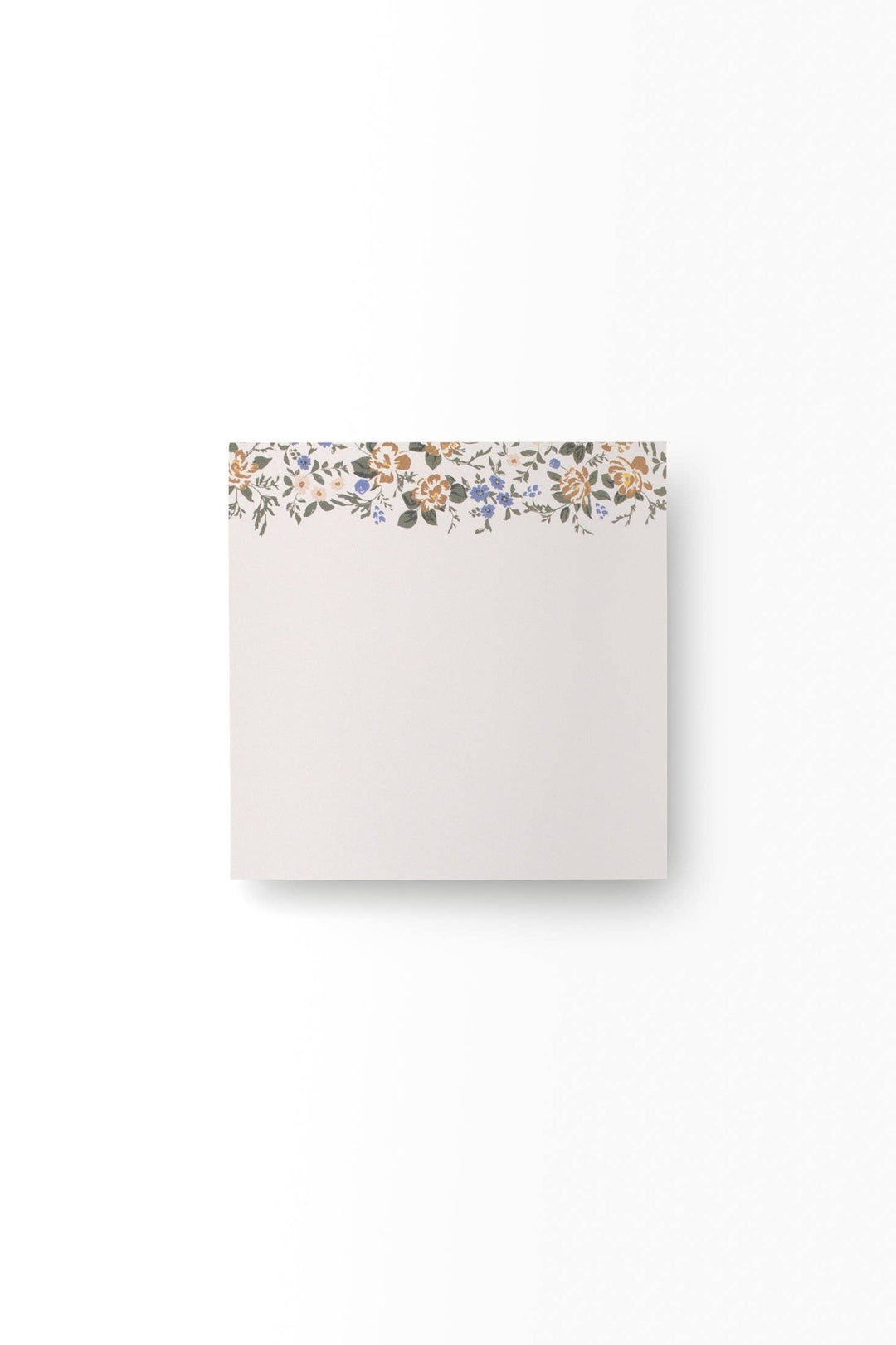Note pad with floral design on a white background